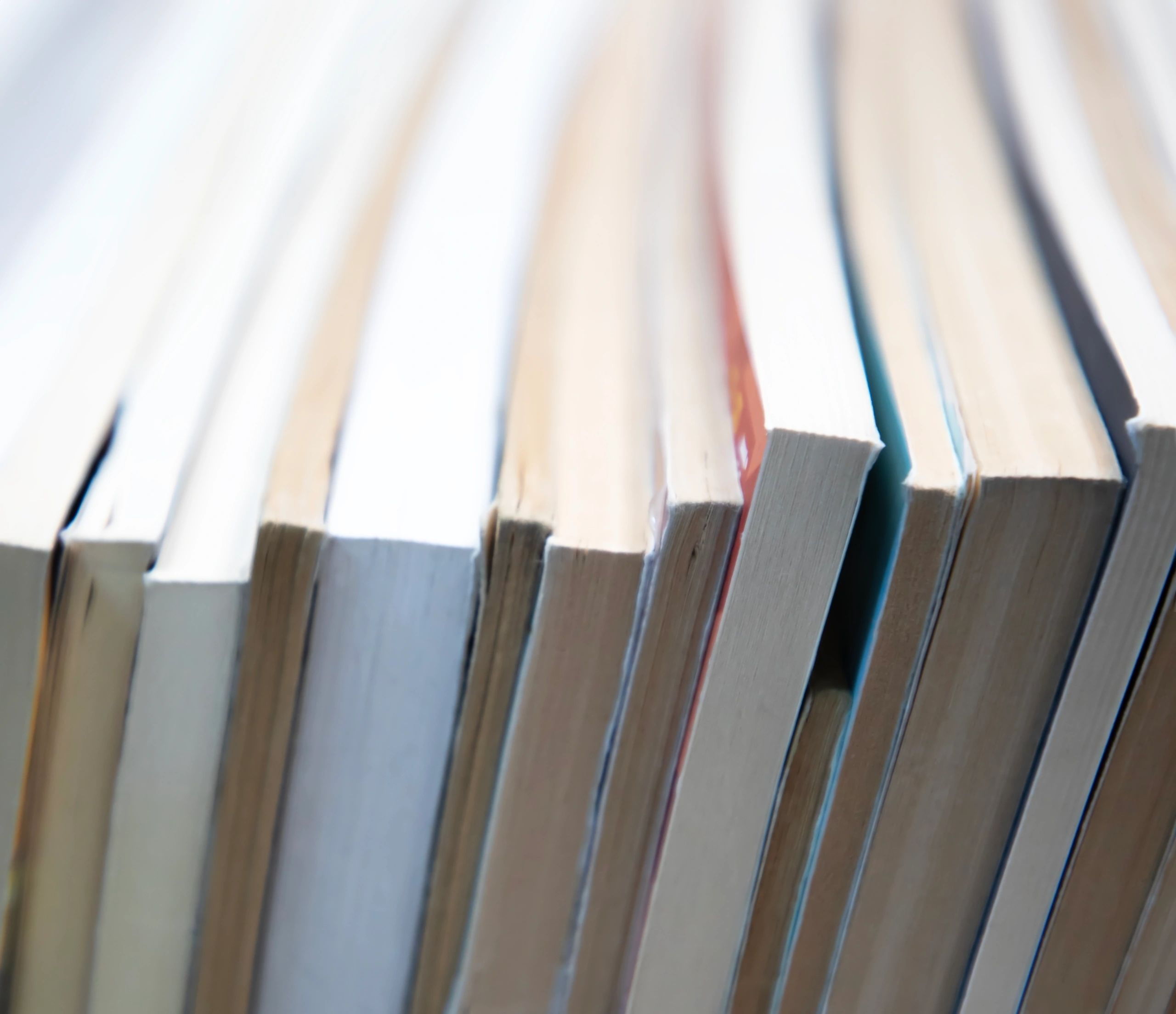 Books on shelves representing academic study and research