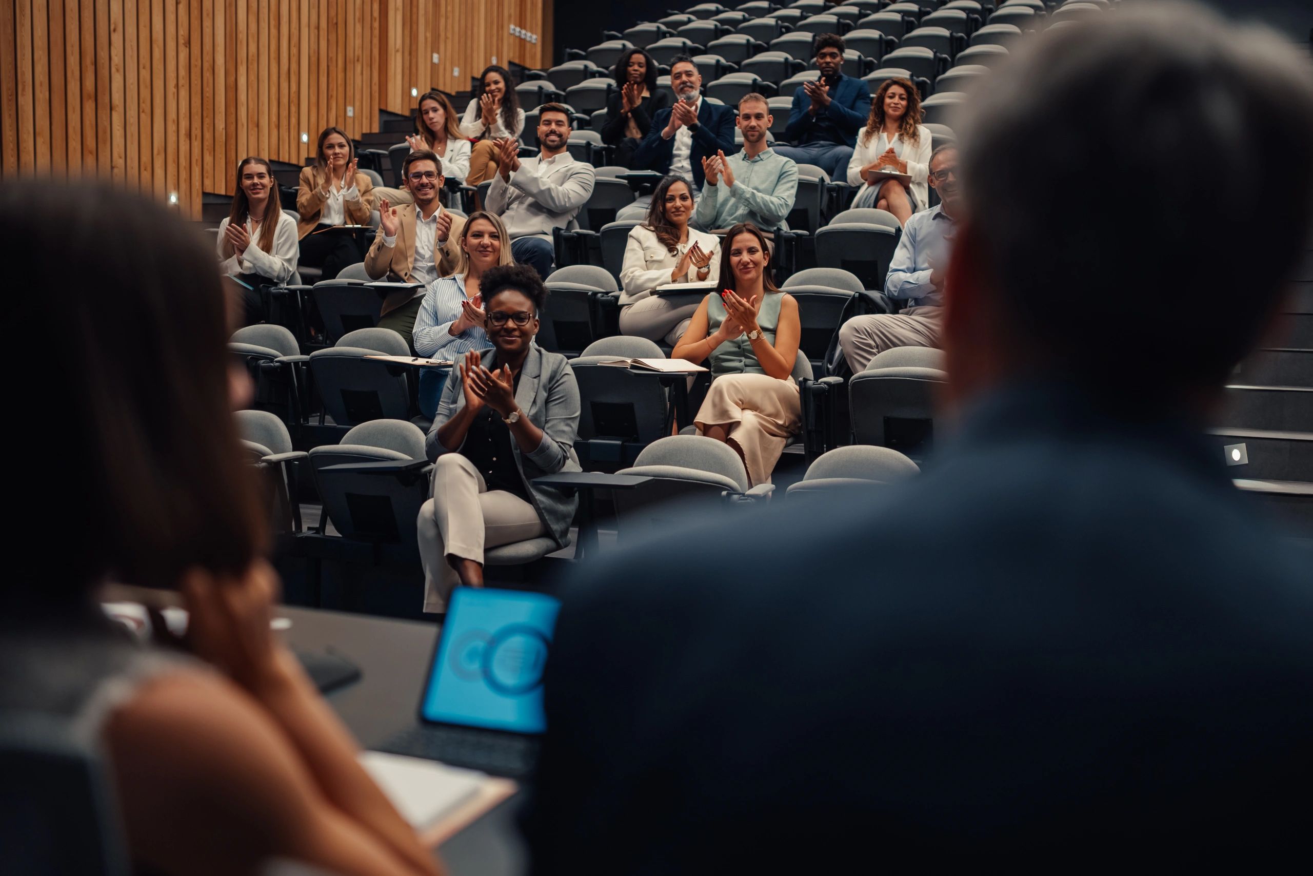 Audience attending an academic conference session