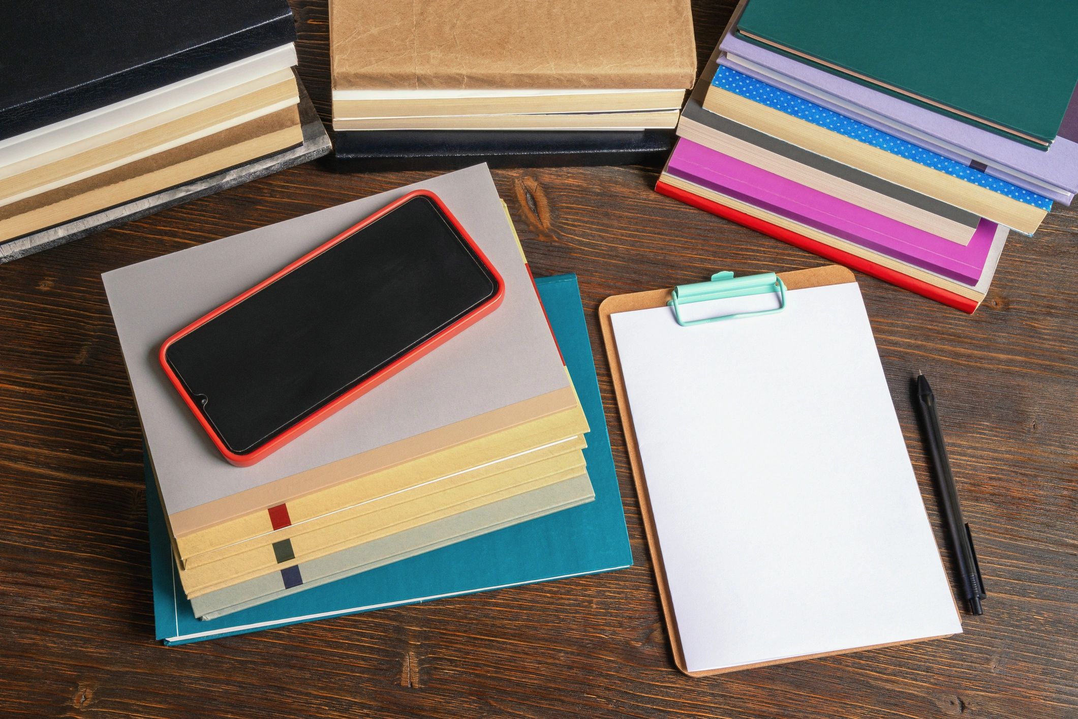 Books and papers arranged on a study table